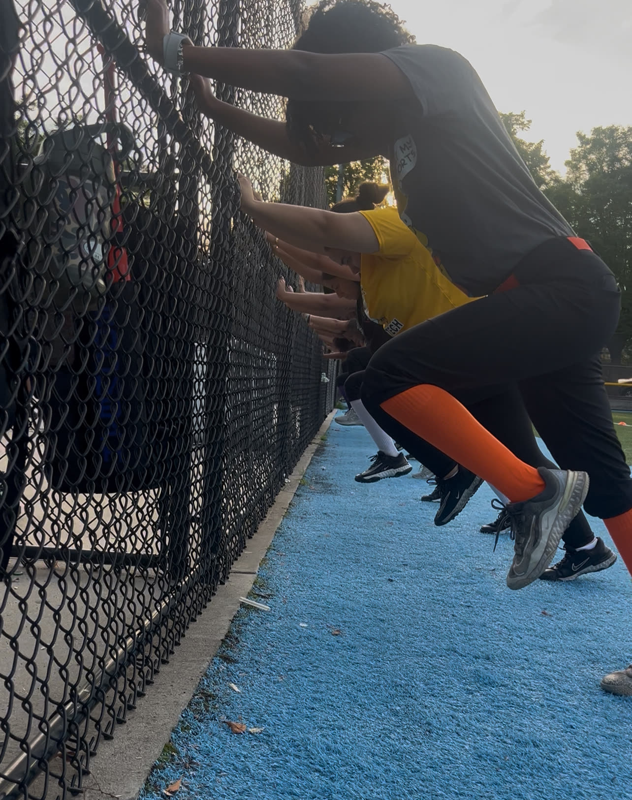 An athlete drives through a lower-body power drill