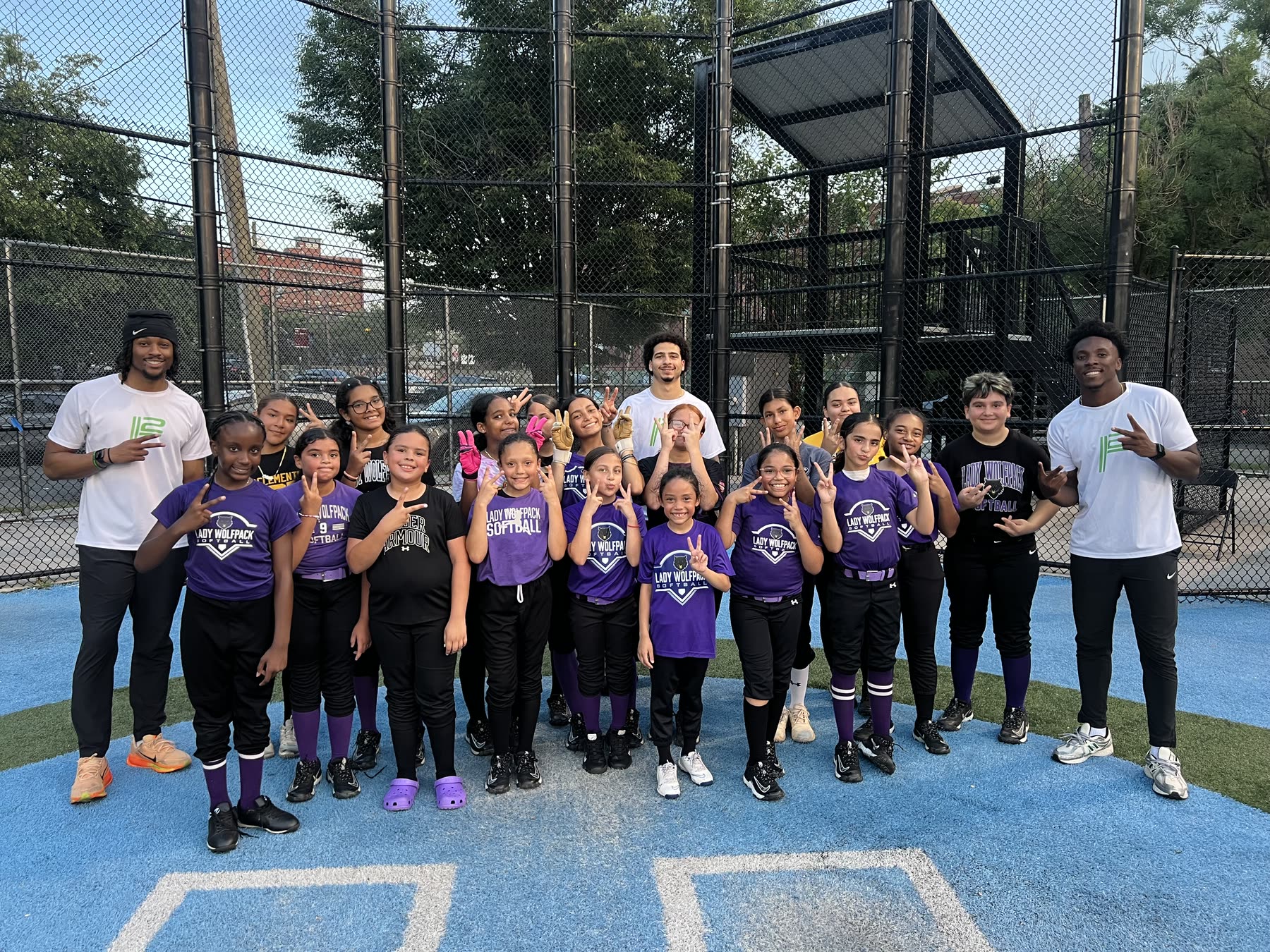 Plus2 Performance coaches with the Lady Wolfpack softball team